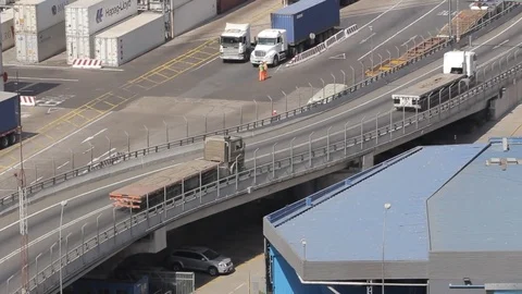 Trucks on port road Stock Footage 77052565