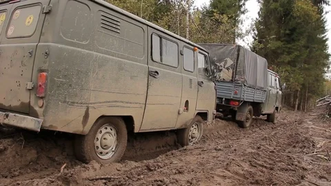Trucks run into the sand in a forest Stock Footage 84204637