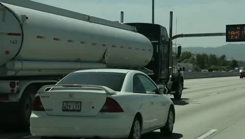 Trucks Semis cars and motorcycles on the highway (3) Stock Footage