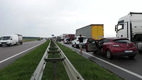 Trucks in a traffic jam in the middle of a field Video stock 161984045