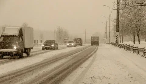 Trucks with a trailer on a winter freeway. Фото