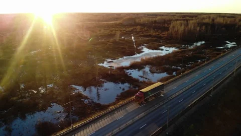 Trucks with trailers drive on the road. Stock Footage 106328735