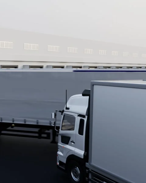 Trucks with trailers parked at warehouse loading dock Видео 329498539