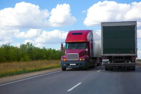 Trucks transporting freight Stock Photos