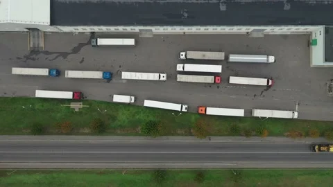 Trucks waiting to be loaded at the logistics center top view. Stock Footage 140750401