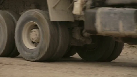 Truck's wheels on a dirt road. Stock Footage 75442969