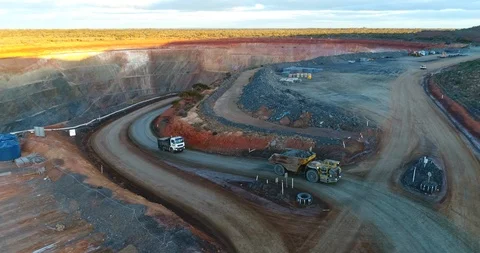 Trucks working on a gold mine Stock Footage 113603253