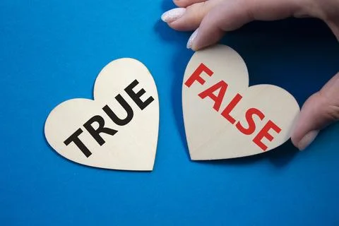 True or False symbol. Concept word True or False on wooden hearts. Business.. Stock Photos