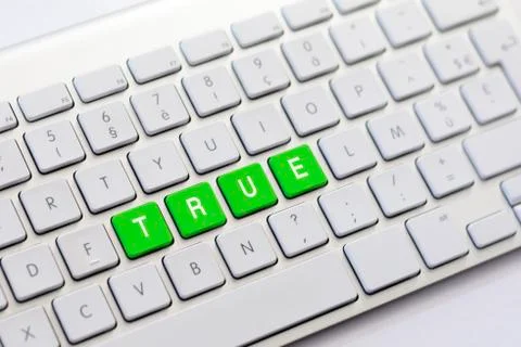 TRUE writing on white keyboard Stock Photos