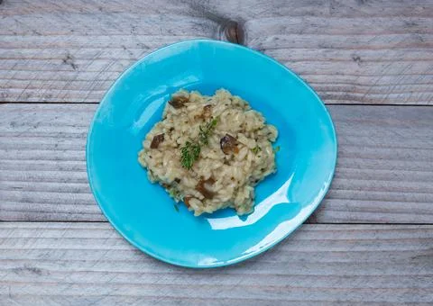 Truffle risotto with thyme on a plate Stock Photos
