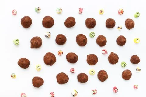 Truffles pattern, top view flat lay of various chocolate Stock Photos