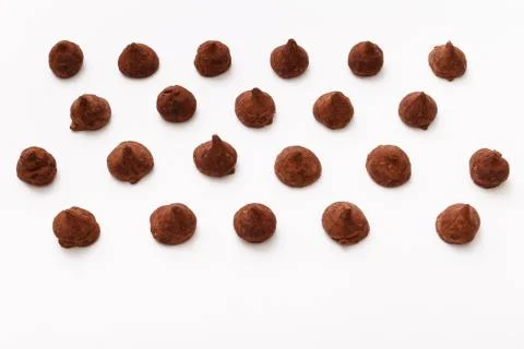 Truffles pattern, top view flat lay of various chocolate Stock Photos