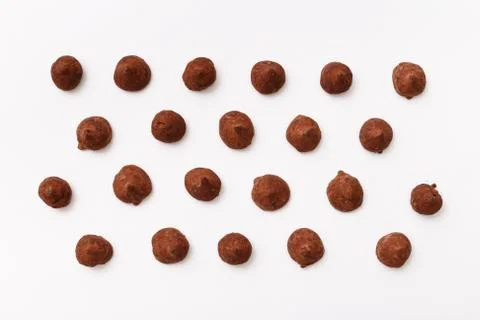 Truffles pattern, top view flat lay of various chocolate Stock Photos