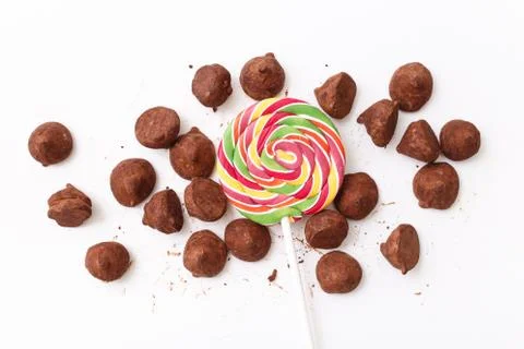 Truffles pattern, top view flat lay of various chocolate sweets Stock Photos