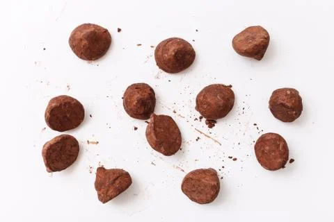 Truffles pattern, top view flat lay of various chocolate sweets Stock Photos
