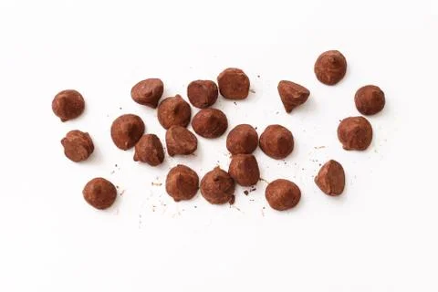 Truffles pattern, top view flat lay of various chocolate sweets Stock Photos