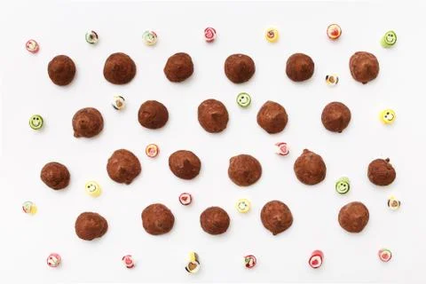 Truffles pattern, top view flat lay of various chocolate Stock Photos