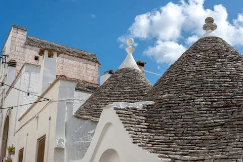 The trullo is a type of conical construction in traditional dry stone from .. Stock Photos