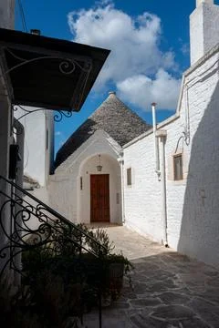 The trullo is a type of conical construction in traditional dry stone from .. Stock Photos