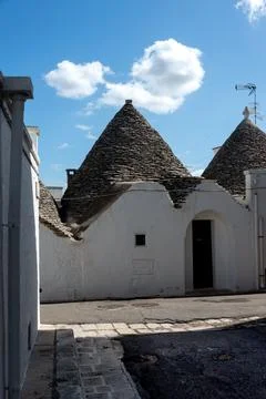 The trullo is a type of conical construction in traditional dry stone from .. Stock Photos