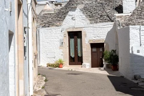 The trullo is a type of conical construction in traditional dry stone from .. Stock Photos