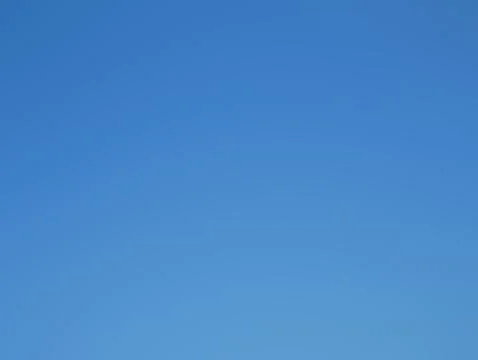 Truly blue sky without clouds taken from real sky daylight on summer time Stock Photos