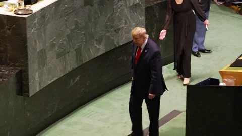 Trump walks from UN General Assembly rostrum after speech Stock-Footage 346265189