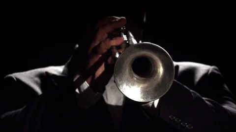 Trumpet Player in Shadows Stock Footage 111953301