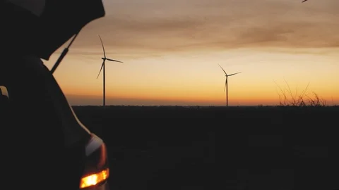 The trunk of the car is automatically closed against the background of wind p Stock Footage 103218132
