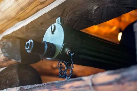 Trunk of a machine gun with a shallow depth of field Stock Photos
