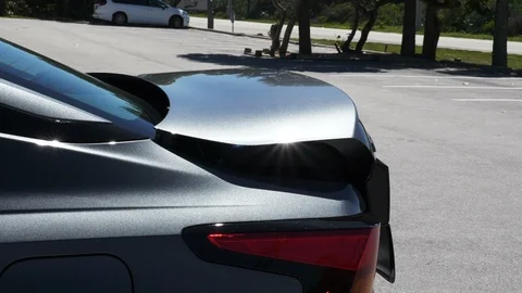 Trunk of Silver Car Opening Slowly in Melbourne, FL Video stock 104805508