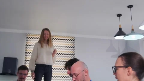 Trust fall team building game in modern office Stock Footage 316193935