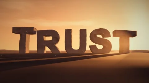Trust Giant Eroded Stone Letters Standing in a Desert at Sunset with Volumetric Stock Footage 342080037