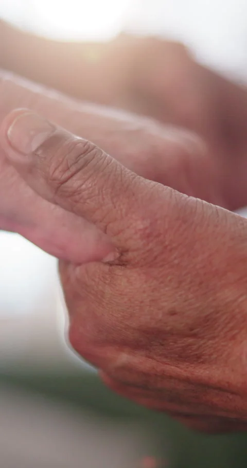 Trust, holding hands and couple in house with love, commitment and security in Stock Footage 338222204