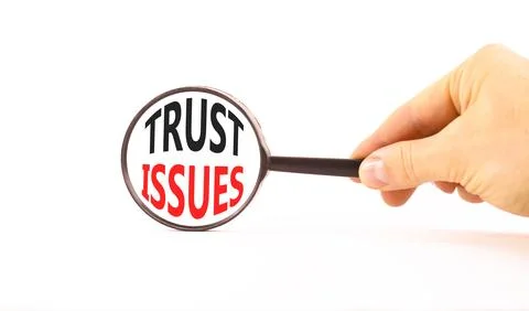 Trust issues symbol. Concept word Trust issues on beautiful magnifying glas.. Stock Photos