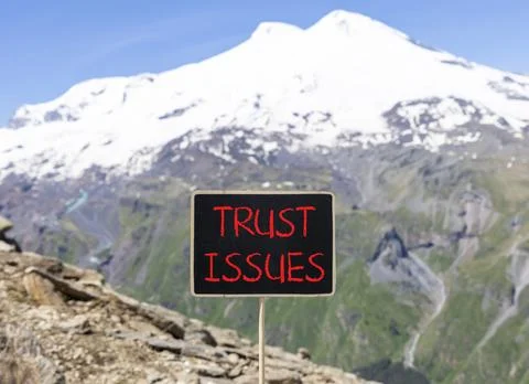 Trust issues symbol. Concept word Trust issues on beautiful black blackboar.. 스톡 사진