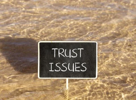 Trust issues symbol. Concept word Trust issues on beautiful black blackboar.. Stock Photos
