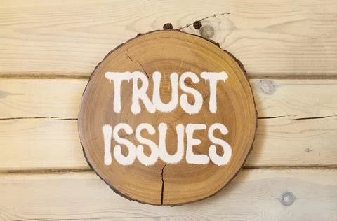 Trust issues symbol. Concept word Trust issues on beautiful wooden circle o.. Stock Photos