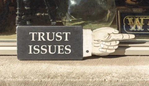 Trust issues symbol. Concept word Trust issues on beautiful black wooden ha.. Stock Photos