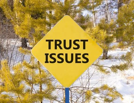Trust issues symbol. Concept word Trust issues on beautiful yellow road sig.. Stock Photos