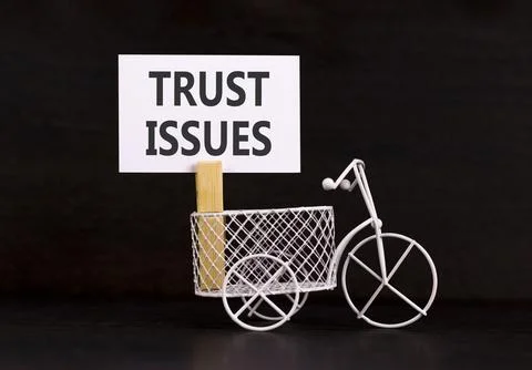 Trust issues symbol. Concept word Trust issues on beautiful white paper. Be.. Stock Photos