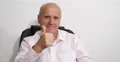 Trustworthy Businessman Showing Confident Thumbs Up in Presentation Interview 4k or 4k+ Resolution