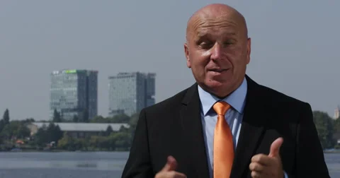 Trustworthy Manager Explaining Business Development Concept in a TV Interview Stock Footage 68440364