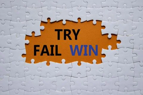 Try Fail Win symbol. Concept words Try Fail Win on white puzzle. Beautiful .. 写真素材