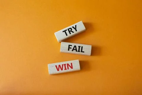 Try Fail Win symbol. Concept words Try Fail Win on wooden blocks. Beautiful.. 写真素材
