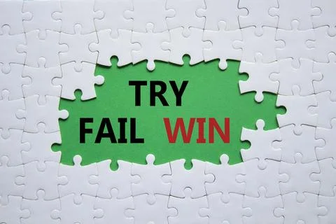 Try Fail Win symbol. Concept words Try Fail Win on white puzzle. Beautiful .. 写真素材