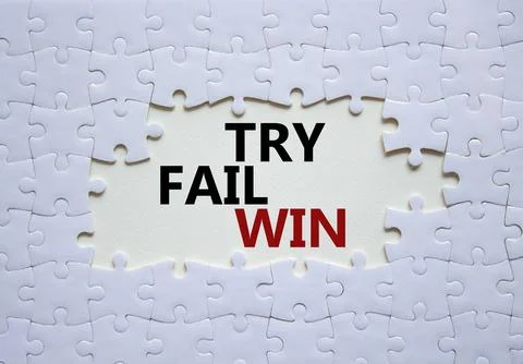 Try Fail Win symbol. Concept words Try Fail Win on white puzzle. Beautiful .. 写真素材
