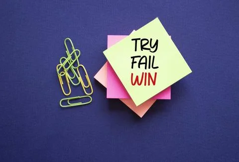 Try Fail Win symbol. Sticky notes with words Try Fail Win. Beautiful deep blu Stock Photos