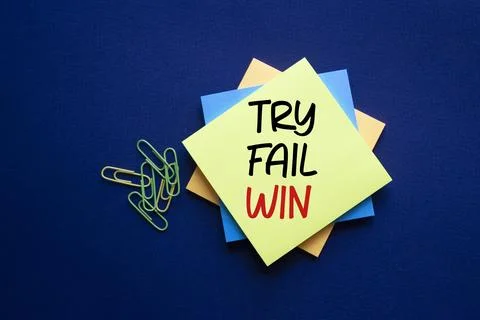 Try Fail Win symbol. Sticky notes with words Try Fail Win. Beautiful deep blu Stock Photos