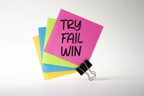 Try Fail Win symbol. Sticky notes with words Try Fail Win. Beautiful white ba Stock Photos